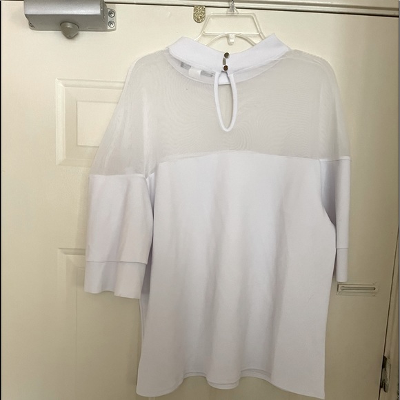 Touch me white top. She has sheer collar and layered bell sleeves - Picture 2 of 3